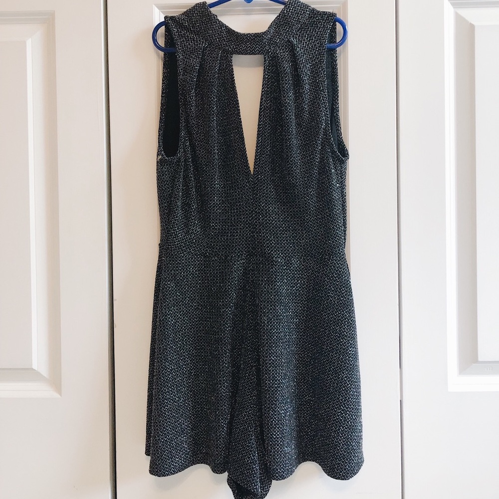 Shimmery black romper with halter neck